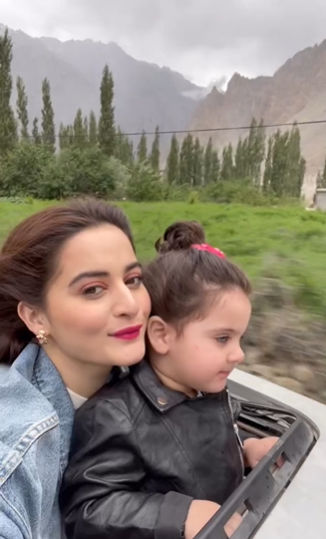 Aiman Khan dazzles in Bold Red Lipstick, Epitomizing Timeless Beauty in Malaysia